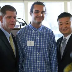  ??  ?? In this 2016 photo, Joel Ortiz (center) poses for a photo with Mayor Marty Walsh (left) and public schools Superinten­dent Tommy Chang (right) during a luncheon for public schools valedictor­ians in Boston. JESSICA RINALdI/ThE BOSTON GLOBE VIA AP