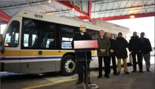  ?? BARRY GRAY, THE HAMILTON SPECTATOR ?? Transporta­tion Minister Steven Del Duca speaks during a press conference as Hamilton council members listen.