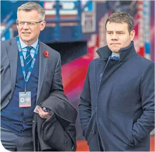  ??  ?? Rangers’ sporting director Ross Wilson (right) alongside managing director Stewart Robertson
