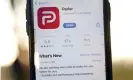  ?? Photograph: Hollie Adams/Getty Images ?? Parler has been taken off Apple’s App Store until it improves its moderation following the US Capitol attack.