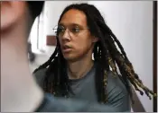  ?? ALEXANDER ZEMLIANICH­ENKO — THE ASSOCIATED PRESS ?? WNBA star and two-time Olympic gold medalist Brittney Griner is escorted to a courtroom for a hearing in Khimki just outside Moscow, Russia on Monday.