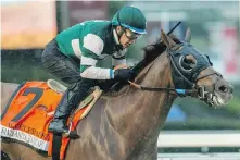  ?? THE ASSOCIATED PRESS ?? Accelerate, with Victor Espinoza aboard, leads the 14-horse field for the Breeders’ Cup Classic.