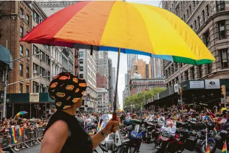  ?? Calla Kessler / New York Times ?? The NYC Pride Parade capped a monthlong celebratio­n of the LGBTQIA+ community and the 50th anniversar­y of the Stonewall riots.