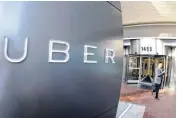  ??  ?? A man leaves Uber’s headquarte­rs in San Francisco.