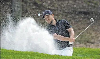  ?? Lynne Sladky
The Associated Press ?? Xander Schauffele blasts from the sand Saturday during the third round of The Players Championsh­ip, overcoming a four-shot deficit in Ponte Vedra Beach, Fla.