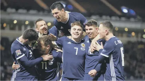  ??  ?? 0 Scotland celebrate their last win over Israel. They will meet again twice in the autumn. Right: Rangers will play Bayer Leverkusen in August. Left: Glasgow City will face Wolfsburg in Spain.