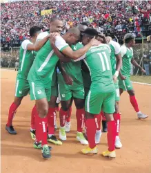  ??  ?? Madagascar players celebrate after scoring against Senegal in the Africa Cup of Nations tie last month