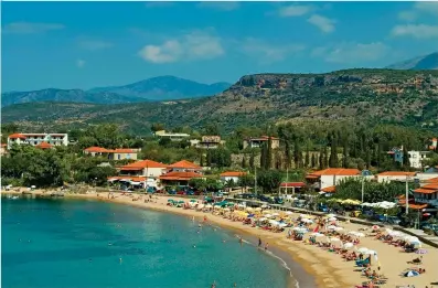  ??  ?? Blissful beach: The curving bay at Stoupa on the Mani peninsular in the Peloponnes­e