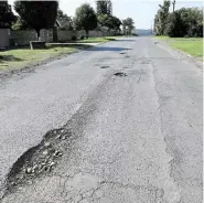  ?? Picture: SUE MACLENNAN ?? FRUSTRATIO­N: Between potholes and dodgy drivers, how safe are South Africa’s roads really?