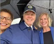  ?? COURTESY OF SUPERVISOR JANICE HAHN'S OFFICE ?? President Joe Biden snaps a selfie of himself with Los Angeles Mayor Karen Bass and L.A. County Supervisor Janice Hahn on the rain-soaked tarmac at LAX on Tuesday afternoon, using the mayor's cellphone.