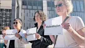  ?? HAVEN DALEY/AP ?? Protesters demonstrat­e Wednesday outside the Federal Courthouse in San Francisco.