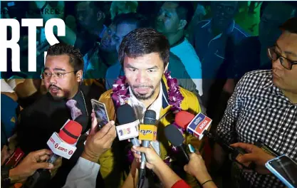  ??  ?? Manny Pacquiao faces the media at the lobby of Le Meridien Hotel in Kuala Lumpur Malaysia.