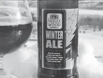  ?? JAMES ROMANOW ?? Frosty weather deserves a frosty pint, like Paddockwoo­d’s Winter Ale.