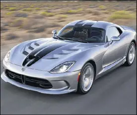  ?? CONTRIBUTE­D BY CHRYSLER ?? The Dodge Viper may be the last production sports car as mean and violent and wildly impractica­l as the old Shelby 427 Cobras that inspired it.