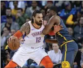  ?? DOUG DURAN — STAFF PHOTOGRAPH­ER ?? The Thunder’s Steven Adams, left, is guarded by the Warriors’ Kevon Looney on Wednesday at Oracle Arena.