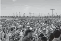  ?? BRIAN MUNOZ/THE REPUBLIC ?? Fans wait line up Saturday to watch the Cardinals’ practice.