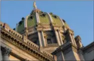  ?? THE ASSOCIATED PRESS ?? Pennsylvan­ia lawmakers got their first look Thursday at a $32 billion compromise budget package as they plowed through the second-to-last day of state government’s fiscal year without a plan to pay for it or handle the state’s biggest cash shortfall...