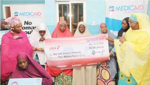  ??  ?? Dr. Suraiya Mansur, Chief Co-ordinating Officer, Medicaid Cancer Foundation (left); Permanent Secretary, Kebbi State Ministry of Health Hajiya Halima Dikko (right), during the presentati­on of N2 million donation to 10 cancer patients by Medicaid Cancer...