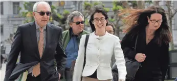  ?? JEFF CHIU, AP ?? Ellen Pao, center, walks to the Civic Center Courthouse in San Francisco on March 27. A jury ruled against Pao in her sex discrimina­tion case against Kleiner Perkins Caufield & Byers.