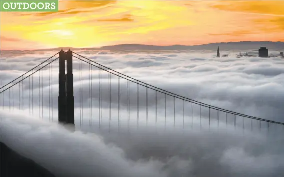  ?? Frederic Larson / The Chronicle 2008 ?? Fog often can obscure the Golden Gate Bridge and the skyline of San Francisco, especially as seen from the Marin Headlands.