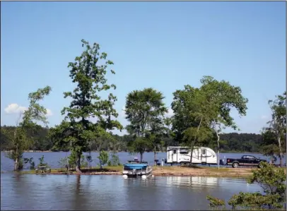  ?? The Sentinel-Record/Corbet Deary ?? BEAUTIFUL SETTING: Located a few miles downstream from where the Ouachita River feeds into the lake, Little Fir Recreation Area is nestled in a beautiful setting.