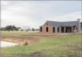  ??  ?? GOING FAST: Only 13 plots are still available at Winelands Village, off the R44 between Stellenbos­ch and Somerset West.