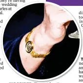  ??  ?? INSCRIBED: The real Camilla wears the G and F bracelet Charles designed