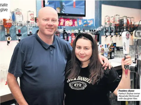  ??  ?? Festive cheer Harley’s Skybar owner Alexander McDowall with daughter Alex