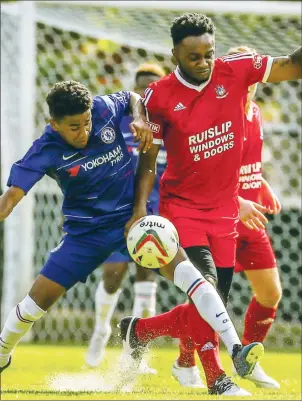  ?? PICTURES: Mark Long ?? WOOD YOU BELIEVE IT! Dean Barker’s Northwood beat a young Chelsea side in a friendly last week to win the Peter Barry Trophy