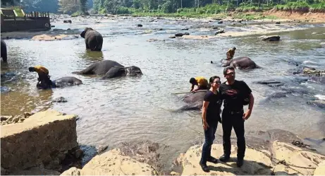  ??  ?? Norcilia and her husband Lob Muhammad soaking up the sights at Pinnawela Elephant Orphanage.