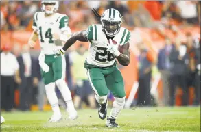  ?? Joe Robbins / Getty Images ?? The Jets’ Isaiah Crowell carries the ball for a 7-yard touchdown in the second quarter against the Cleveland Browns on Sept. 20.