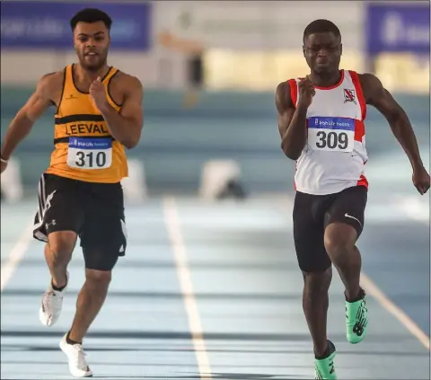  ?? Pic: Sportsfile ?? Israel Olatunde of Dundealgan AC on his way to winning the Junior Men 60mat the Irish Life Health Junior and U23 Indoors.