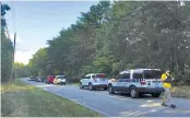  ?? STAFF PHOTO BY EMMETT GIENAPP ?? Emergency personnel respond Wednesday evening to an incident in Sale Creek where a man barricaded himself inside a home.