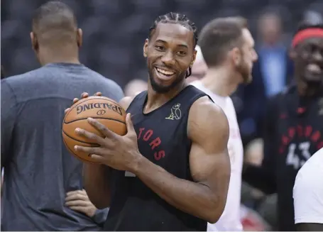  ?? ASSOCIATED PRESS ?? NEW BEGINNING: Kawhi Leonard, who won a championsh­ip in Toronto, will join forces with Paul George to help the Los Angeles Clippers battle LeBron James and the Lakers at the top of the Western Conference.