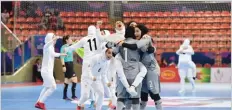  ??  ?? the-afc.com Iranian players celebrate after beating Japan 5-2 in the final of the 2018 AFC Asian Women’s Futsal Championsh­ip in Bangkok, Thailand, on May 12, 2018.