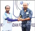  ??  ?? Man of the Match - Cleetus of Indian Strikers
receives the award from Lorry Travasso.