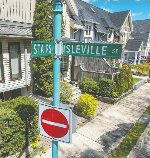  ?? ANDREW VAUGHAN / THE CANADIAN PRESS ?? A sign marks Stairs Place in the north end of Halifax. The street was named for William Grant Stairs, a Canadian explorer from Halifax who helped lead some of the most controvers­ial expedition­s through the African continent.