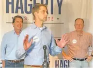  ?? STAFF PHOTO BY ANDY SHER ?? U.S. Sen. Tom Cotton, R-Arkansas, center, speaks on behalf of Tennessee Republican U.S. Senate hopeful Bill Hagerty, left, during a Friday rally in Franklin, Tenn. Pictured at right is Tennessee Senate Majority Leader Jack Johnson.