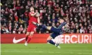  ?? Photograph: Paul Currie/Shuttersto­ck ?? Granit Xhaka fouls Liverpool’s Diogo Jota, for which the Arsenal midfielder was shown a straight red card.