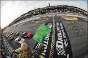  ?? ASSOCIATED PRESS ?? The NASCAR season resumes today at Darlington Raceway without spectators. What’s more, drivers will have had no practice before pulling away from pit road for the first time in more than two months. “That’s going to be really unique,” Erik Jones says. “Walking out to the grid and just hopping in the car.”