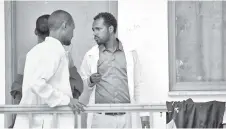  ??  ?? Welday Hagos (right), director of the Substance Rehabilita­tion Centre, the only facility in Ethiopia that offers long-term drug and alcohol addiction treatment, speaks with patients in Mekele.