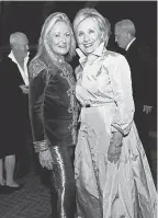  ?? AP ?? Hillary Clinton, with Ricky Lauren, was among the scores of A-listers at the Ralph Lauren bash.