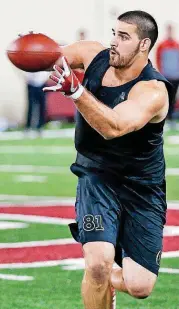  ?? [PHOTO BY NATE BILLINGS, THE OKLAHOMAN] ?? ESPN analyst Todd McShay believes Mark Andrews will be drafted in the second or third round of the 2018 NFL Draft.