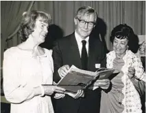  ?? U-T FILE ?? Margaret (left) and Hamilton Marston hold family memorabili­a at a reunion luncheon in 1978 celebratin­g the 100th anniversar­y of the founding of Marston’s department store.