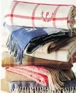 ?? MARK & GRAHAM/WILLIAMS-SONOMA ?? A super-soft throw with an antler monogram at Mark &amp; Graham makes a cosy holiday gift.
