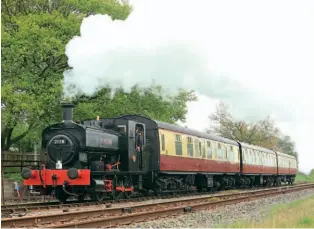  ?? PHIL MARSH ?? Barclay 0-6-0ST Swordfish hauls its first train at Quainton Road on April 25.