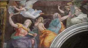  ?? (AP/Andrew Medichini) ?? A detail of the 1514 fresco “Sybils Receiving Instructio­n From Angels” by Italian High Renaissanc­e master painter Raffaello Sanzio, known as Raphael, adorns the inside of Santa Maria della Pace church in Rome. Elsewhere in Europe, art lovers have been relying on virtual tours during the covid-19 pandemic to view works of art held by famous institutio­ns such as the Uffizi in Florence and the Vatican Museums in Rome.