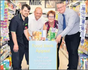  ??  ?? The Co-op is celebratin­g after its Summer Food Bank appeal fed 35,000 children at risk of holiday hunger this summer.