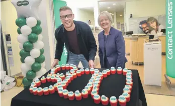  ??  ?? Andrew ‘Freddie’ Flintoff and Specsavers founder Dame Mary Perkins at the opening of the 800th Specsavers store