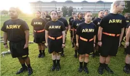  ?? SEAN RAYFORD/AP ?? Army prep course students stand at attention Aug. 27 after physical training at Fort Jackson in Columbia, S.C. The Army fell 25% short of its recruitmen­t goal this year.